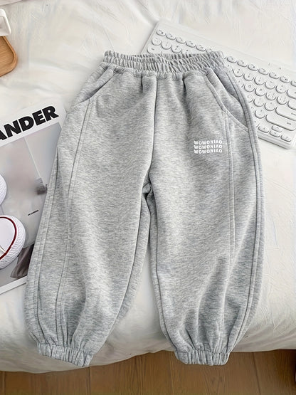 Wwowoniao Boys' Relaxed Fit Jogger Pants Made from a Featuring an Alphabet Design, Slightly Stretchy Knit Material, Equipped with Pockets, Suitable for Spring And Fall, Composed of 58% And 42% Polyester, Ideal for Outdoor Activities