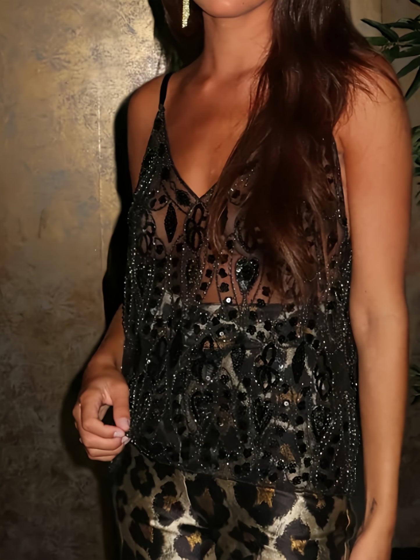 A Halter Top Adorned with Sequins And Beads, Combined with a Sleek And Flattering Short V-Neck Vest, Radiates a Charming And Elegant Femininity