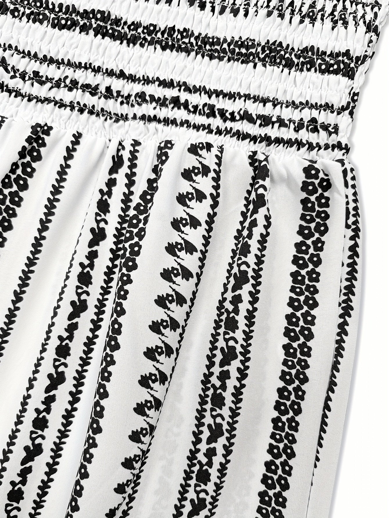 Elegant Black And White Printed Jumpsuits, Fashionable Striped Prints, Lapel Design, Off-The-Shoulder, Strapless, Perfect for Summer, Shopping, And Leisure Vacations, Floral Print Jumpsuit | Fabric