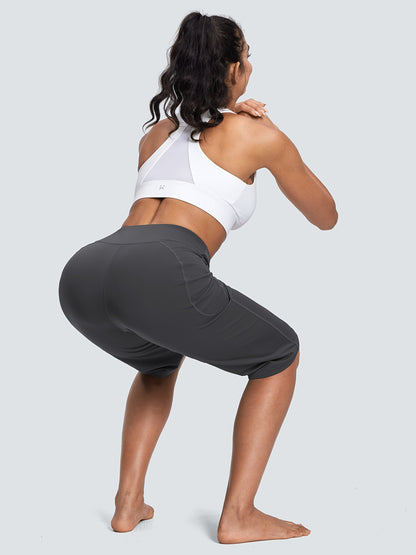 18-Inch Capri Trousers for Women Featuring a High Waist, Pockets, Tummy Control, And a Loose Straight Leg Design Suitable for Workouts And