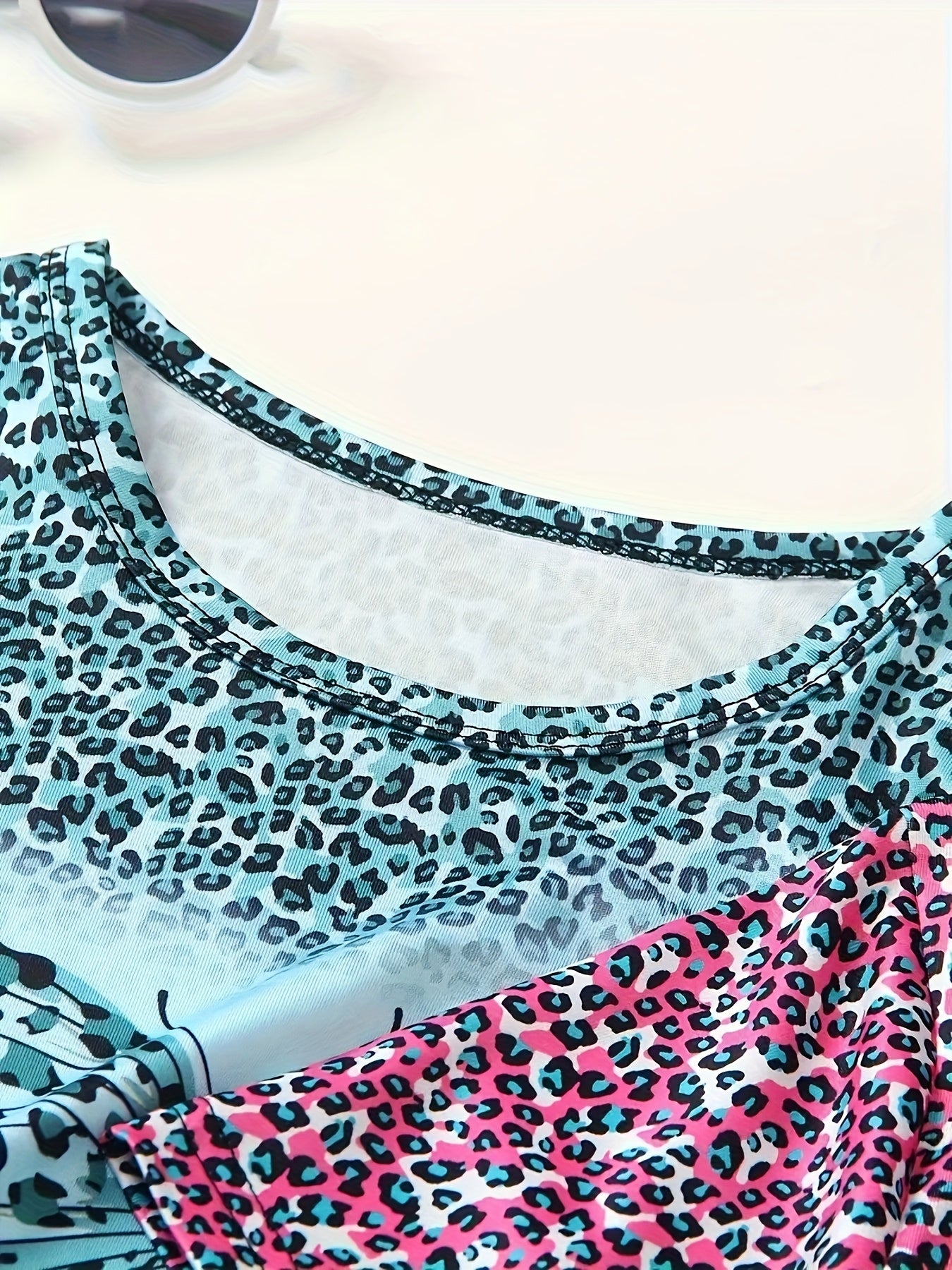Set of 4 Girls' Outfits for Spring And Summer Featuring Butterfly And Leopard Print Short-Sleeve Tops Paired with Slim-Fit Shorts. Made from a Machine-Washable, These Clothes Are Perfect for Everyday Wear And Activities, for Outdoor