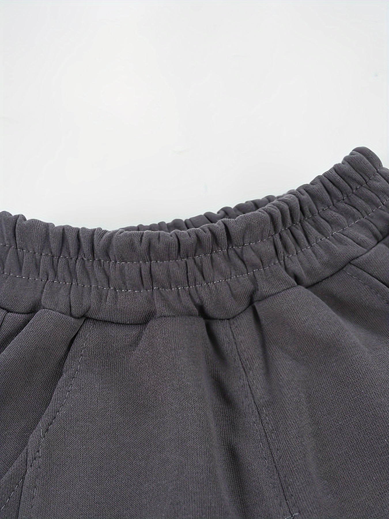 Wwowoniao Boys' Relaxed Fit Jogger Pants Made from a Featuring an Alphabet Design, Slightly Stretchy Knit Material, Equipped with Pockets, Suitable for Spring And Fall, Composed of 58% And 42% Polyester, Ideal for Outdoor Activities