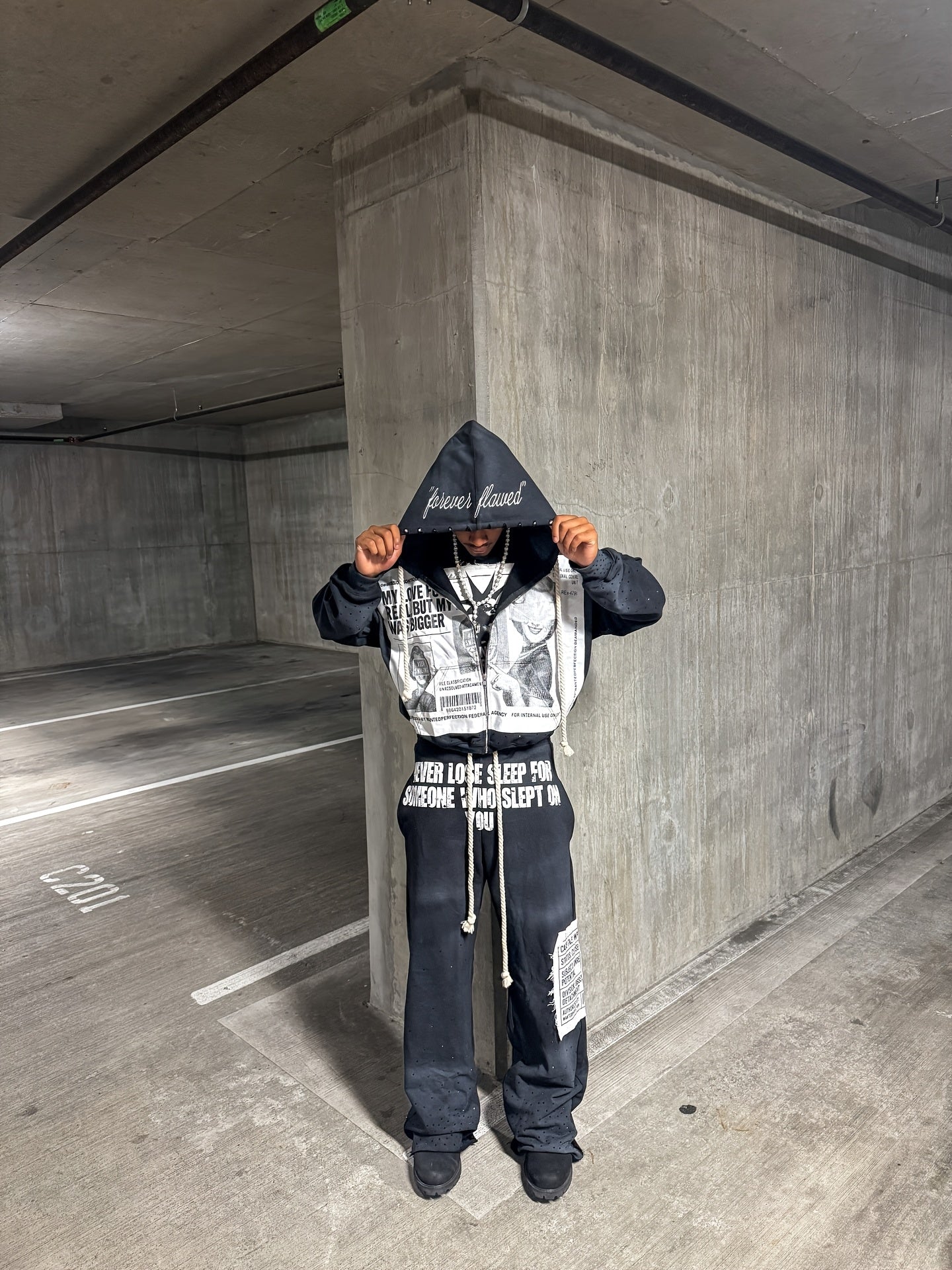 Trendy American Hoodie with a Unique Design, Featuring a Loose Fit Suitable for All Genders, Inspired by Hip-Hop And Harajuku Styles. This Dark Sweatshirt Is Part of a Viral Clothing Brand, Perfect for Streetwear Enthusiasts