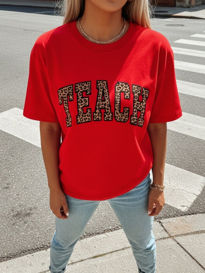 Women's Leopard Print Teacher T-Shirt- Comfortable Round Neck Short Sleeve with LEOPARD SPOT TEACH Design and Team Letters- 180g Heavyweight Casual Top Suitable for Educators,