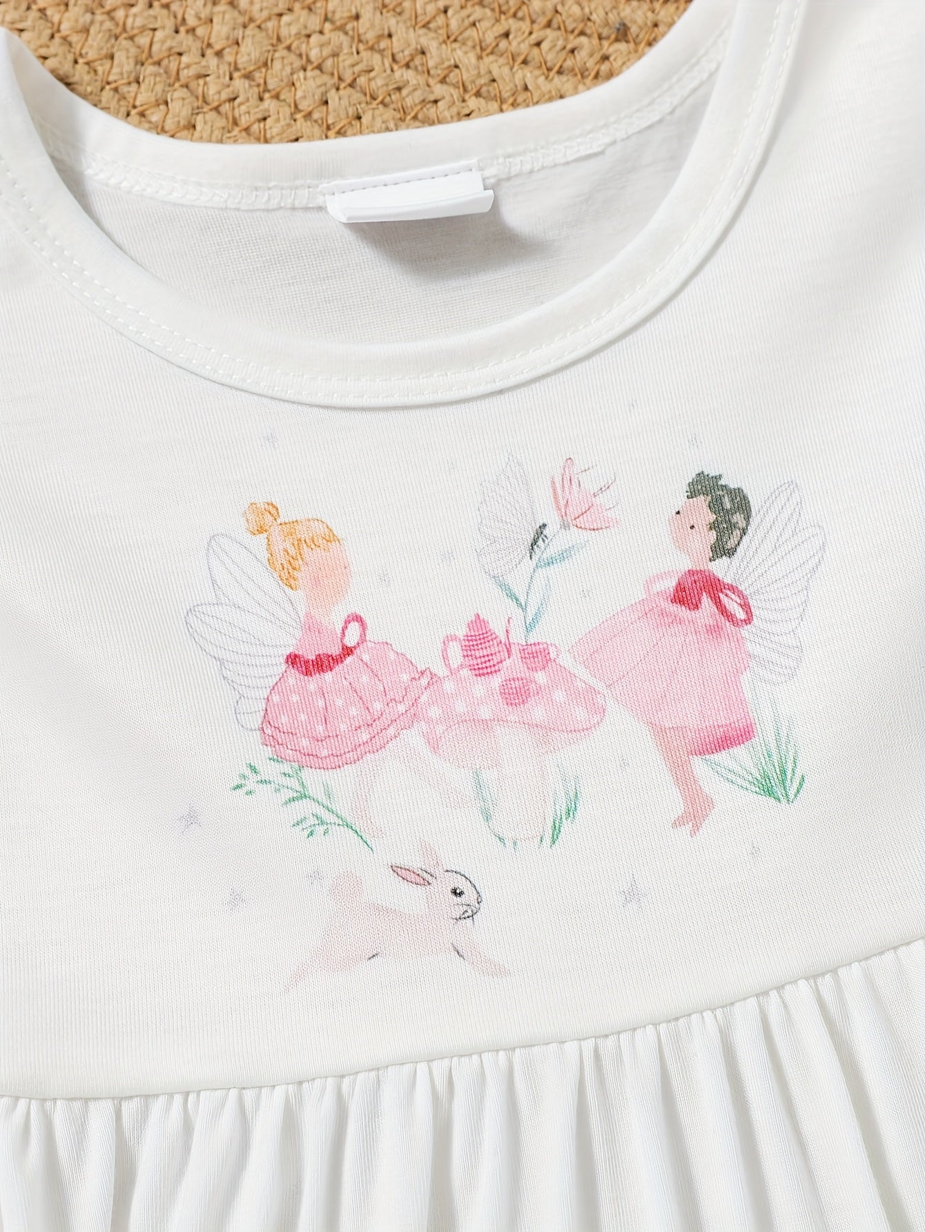 A Cute And Casual Outfit Set for Baby Girls Featuring a Pink Floral Print Dress with Flutter Sleeves, Designed for Spring And Summer.