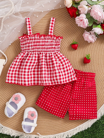 Set of 2 Girls' Outfits for Spring And Summer: a Gingham Dress with a Strawberry Print And Bow, Paired with Red Polka Dot Shorts. This Casual Set Is Machine Washable And Ideal for Toddlers, Featuring a Comfortable Spandex Design, for Outdoor
