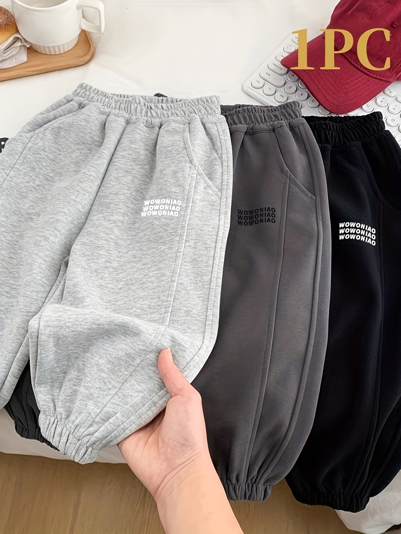 Wwowoniao Boys' Relaxed Fit Jogger Pants Made from a Featuring an Alphabet Design, Slightly Stretchy Knit Material, Equipped with Pockets, Suitable for Spring And Fall, Composed of 58% And 42% Polyester, Ideal for Outdoor Activities