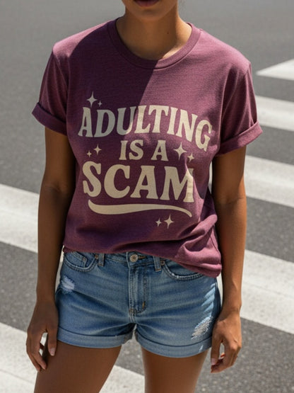 Women's Funny "Blended Adult Is a Scam" T-Shirt - Retro Humorous Slogan Short Sleeve Round Neck Blouse Suitable for Her Gift, Casual Statement Top for Daily Wear & Humor Apparel, Machine Washable Comfortable Everyday Outfits