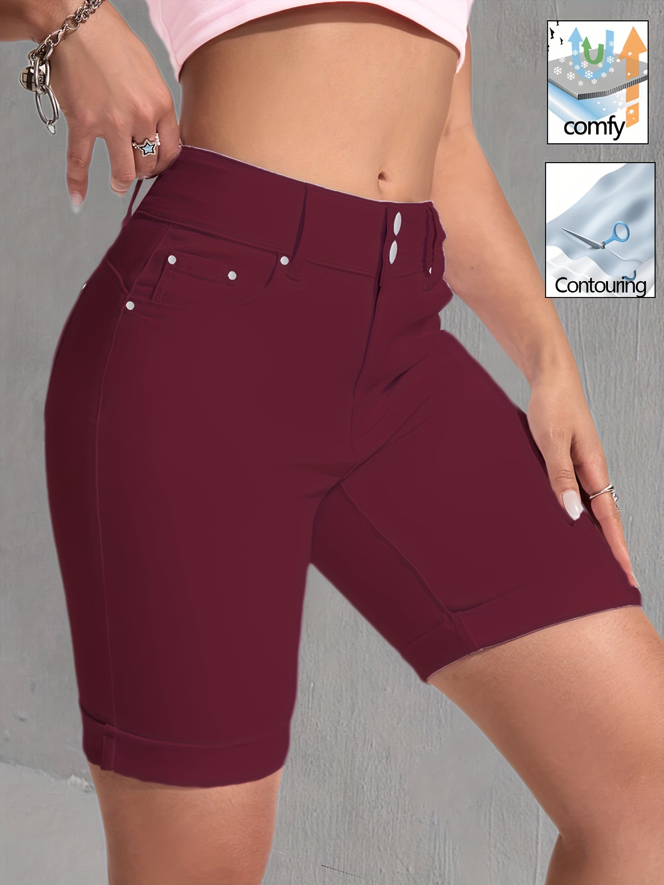 Slim Fit High-Waisted White Stretch Denim Bermuda Shorts for Women Featuring a Double Button Design, Rivet Details, And Cuffed Hems. Made from Soft, Flexible Fabric That Contours to The Figure