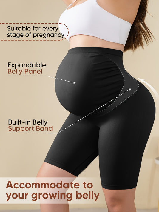 Beige High-Waisted Maternity Shorts Featuring Back Support, an Expandable Belly Panel, And a Built-In Band for Comfort During Pregnancy. They Are Breathable And Stretchy with a Ribbed Design, Perfect for Yoga And Casual Wear
