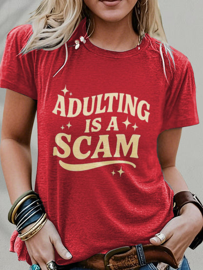 Women's Funny "Blended Adult Is a Scam" T-Shirt - Retro Humorous Slogan Short Sleeve Round Neck Blouse Suitable for Her Gift, Casual Statement Top for Daily Wear & Humor Apparel, Machine Washable Comfortable Everyday Outfits