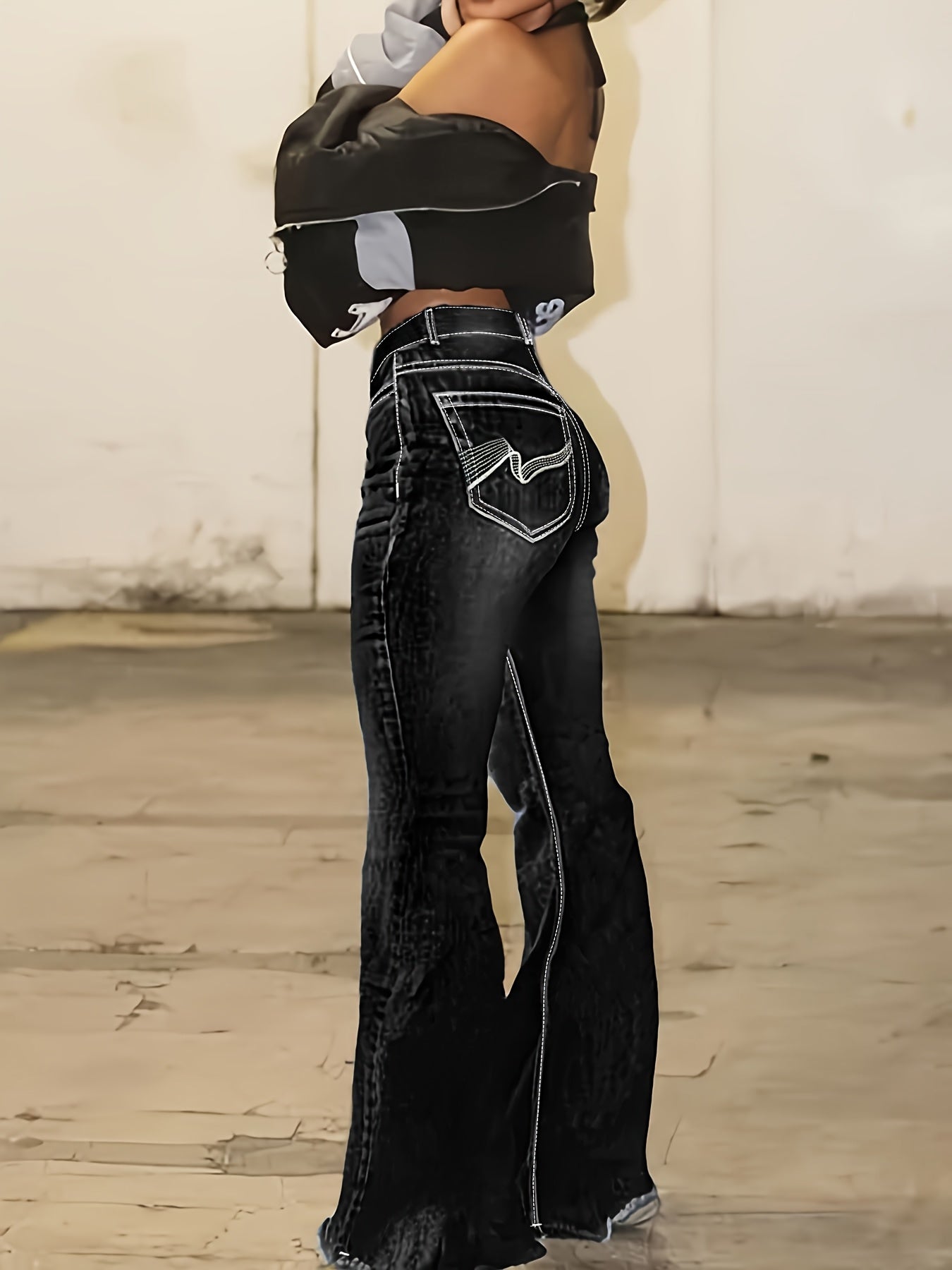 Women'S Denim Trousers Featuring Black Irregular Graphic Embroidery, a Spacious Back Pocket, High Waist, Flared Design, Durable Contrasting Color Wash, And Cat Whiskers, Embodying a Sophisticated Retro Aesthetic