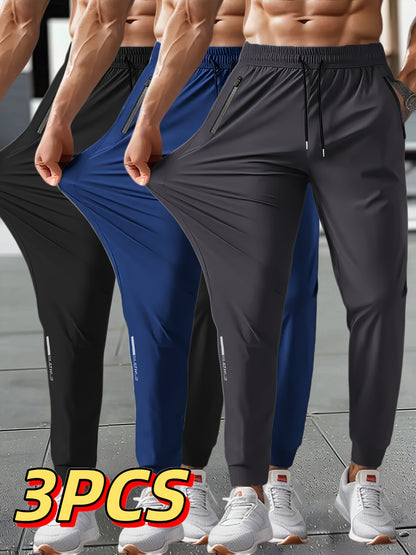 3pcs Men's Summer Solid Color Tapered Sports Pants, High Stretch Fiber, with Ribbed CuffDesign, Nylon 80%Spandex 20%, Reflective Stripe Design At The Hem Of Pants, Regular Fit with ZipperPockets, Breathable ComfortableRunningTraining LongTrousers