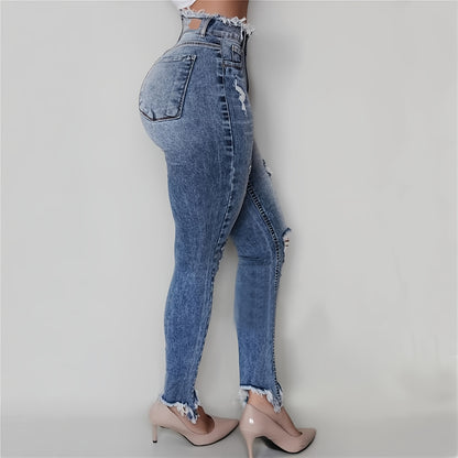 Irregularly Ripped Jeans for Women, Mid-Rise Style, Blue Denim, Featuring a Frayed Edge Design. A Classic And Versatile Choice for Any Season, Part of The New Autumn Collection with Fresh Stock from Local Warehouses. Available at Prices