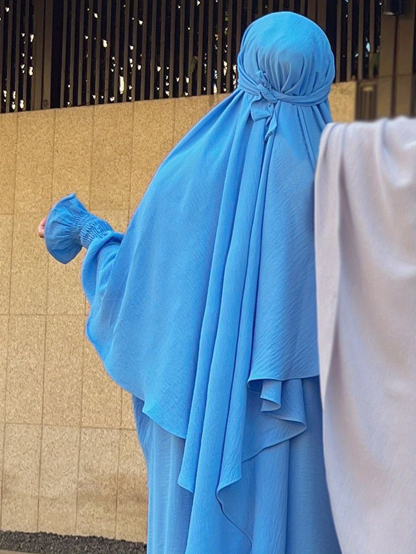 Muslim Player Wearing a Hijab for Umrah