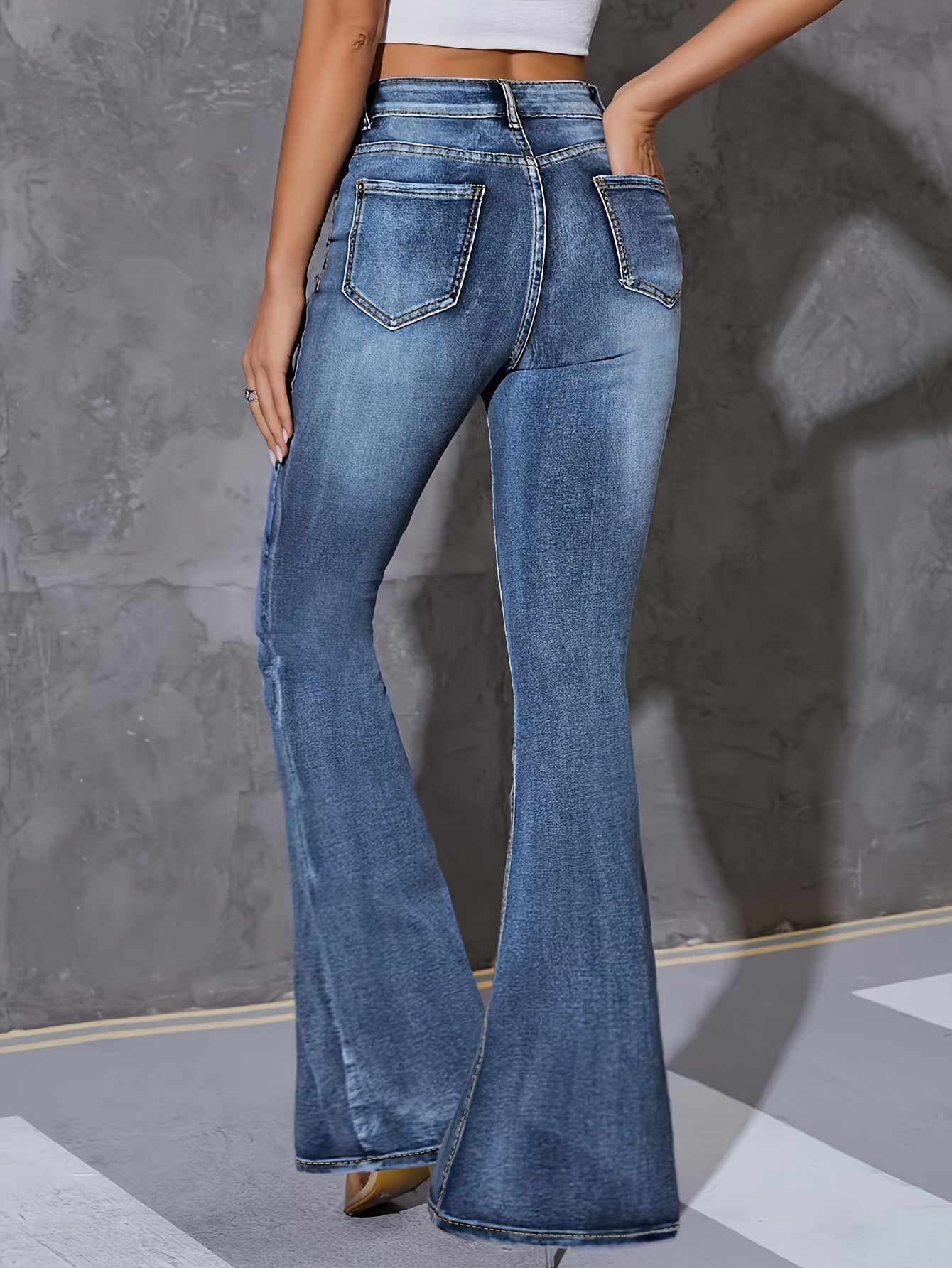 Fashionable And Versatile High-Waisted Stretchy Blue Flared Jeans for Women.