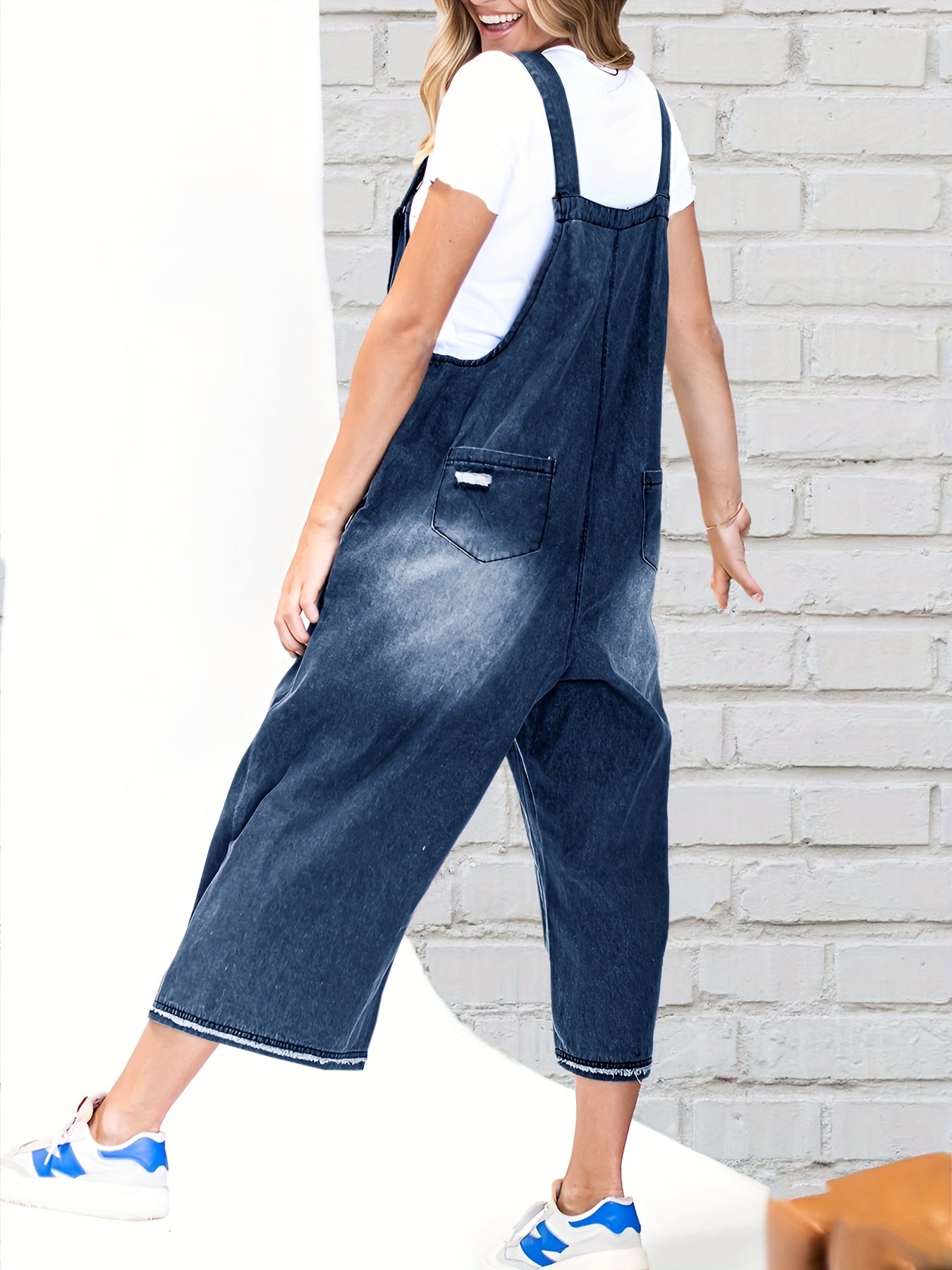 Casual Denim Overalls for Women Featuring a Loose Fit, Adjustable Straps, Distressed Design, And Pockets