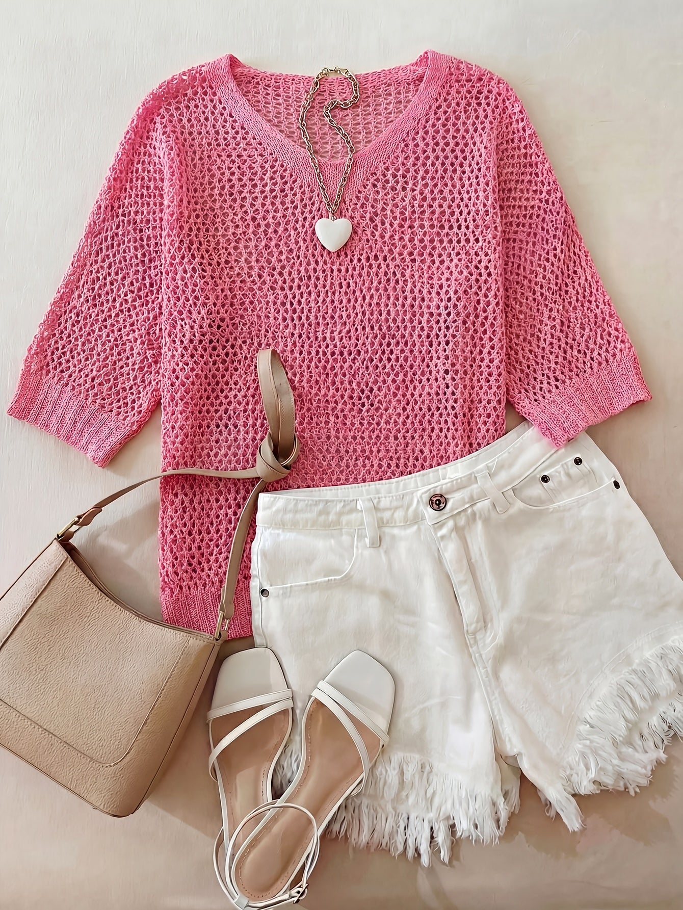 A Stylish Loose-Fitting Top with a Solid Color, V-Neck, And Hollow Design, Featuring Short Sleeves And New.