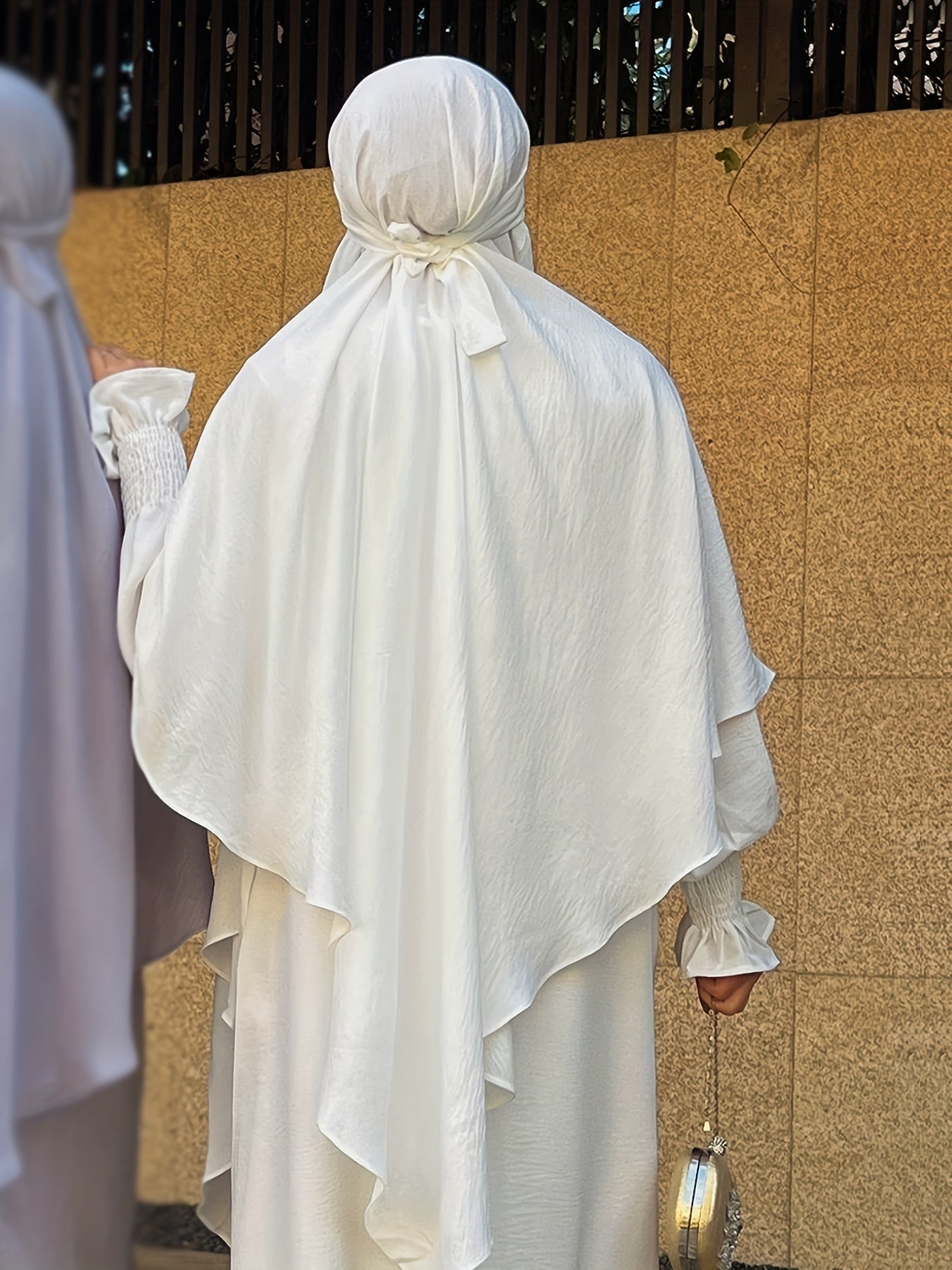 Muslim Player Wearing a Hijab for Umrah